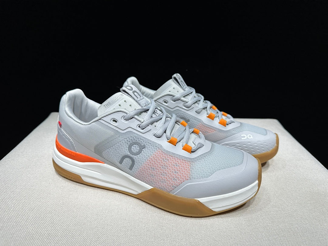 On THE ROGER Advantage Pro Tennis Shoes, in Grey and Orange - product image from the listing.