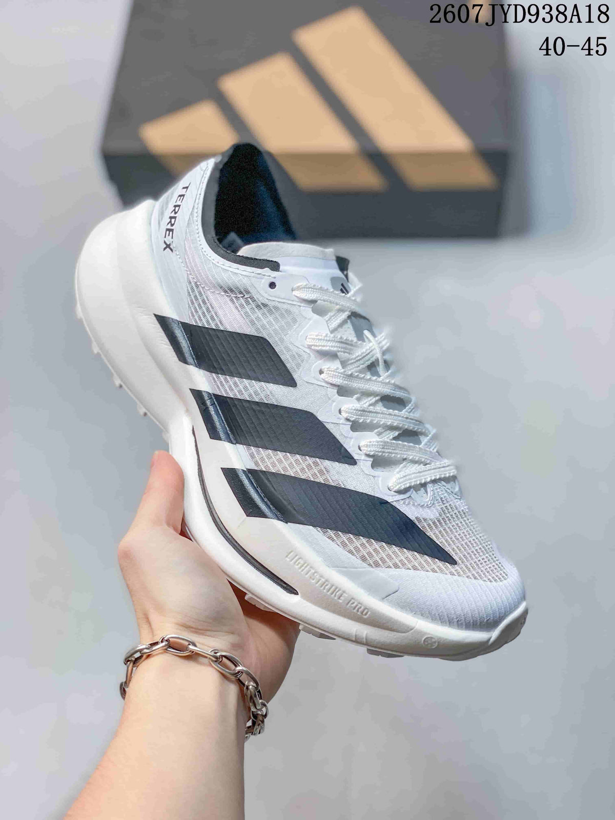 Adidas Adizero Evo SL 2 Running Shoes in White Black 2607TYD938A18 - product image from the listing.