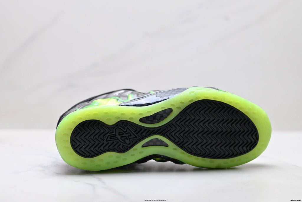Nike Penny Hardaway Foamposite Sneakers, in Black and Volt Green - product image from the listing.