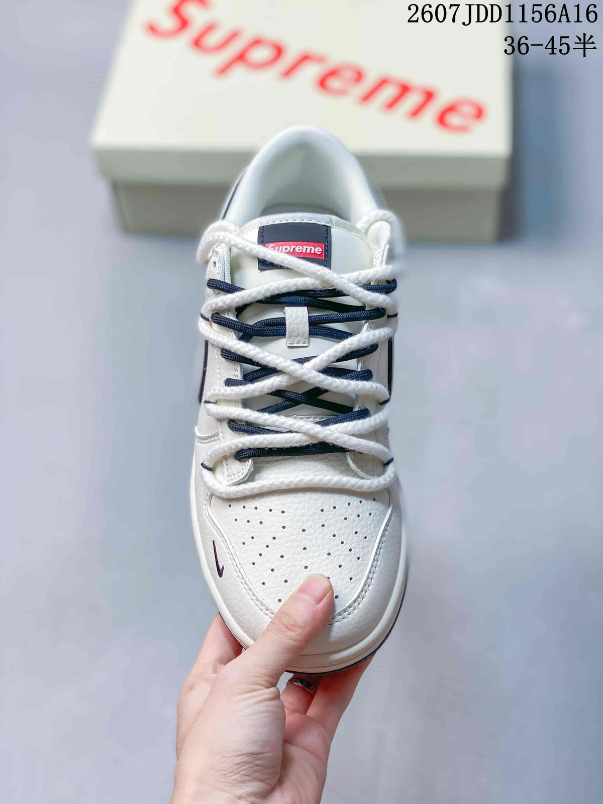 Nike SB Dunk Low Supreme Sneakers in Off-White - product image from the listing.