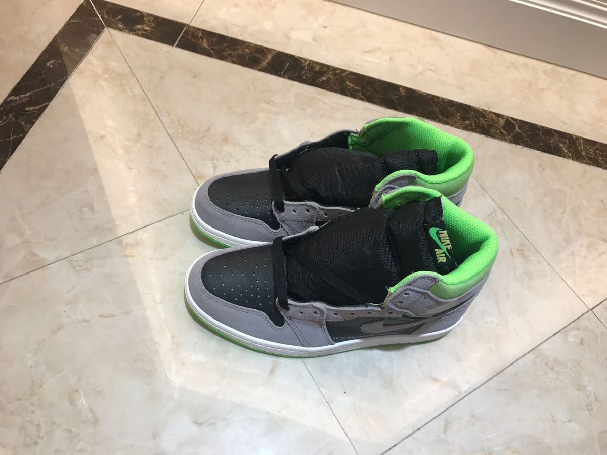 Jordan 1 Retro High OG High-Top Sneakers in Grey Green - product image from the listing.
