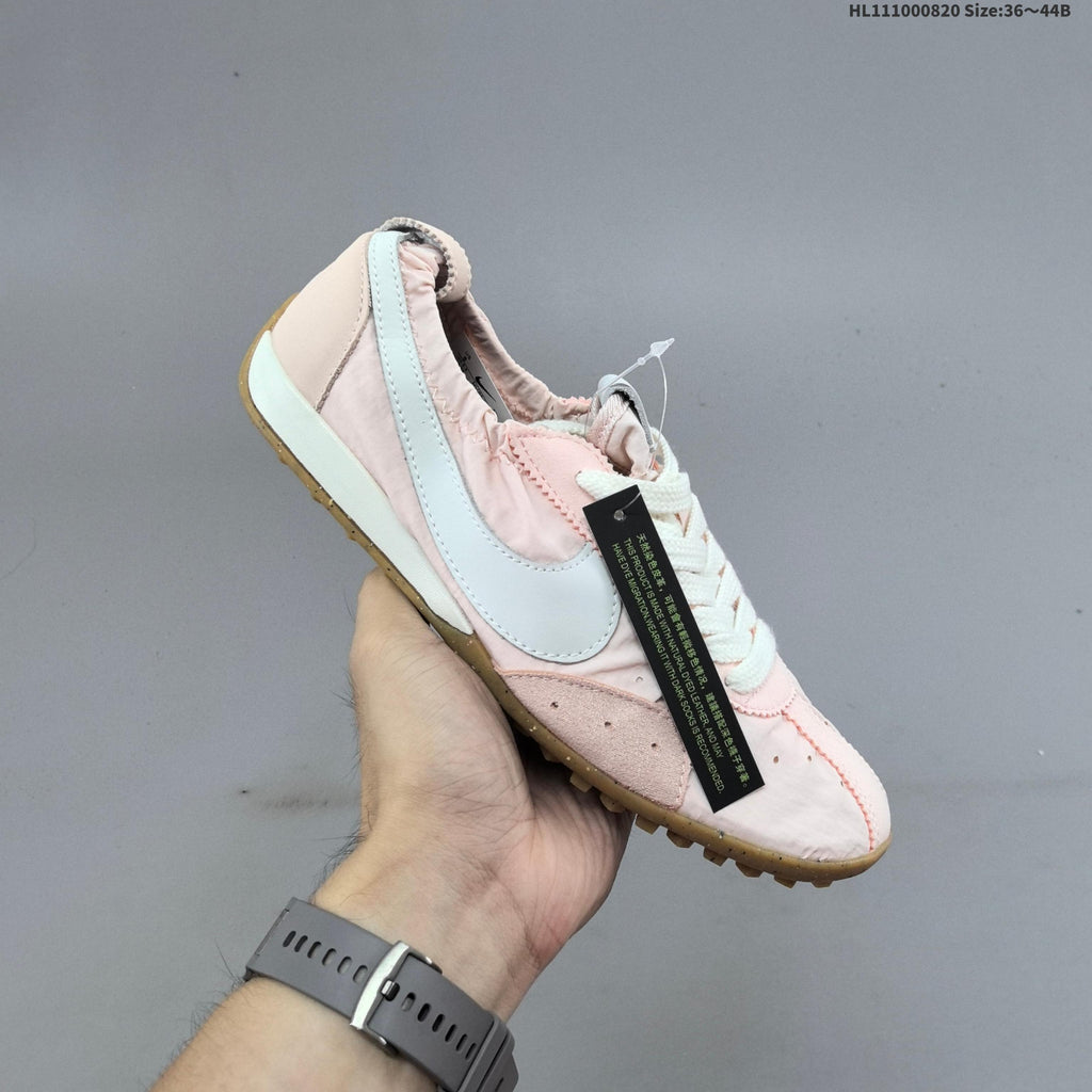 Pink Jacquemus x Nike Jacumoon Low-Top Sneakers - product image from the listing.