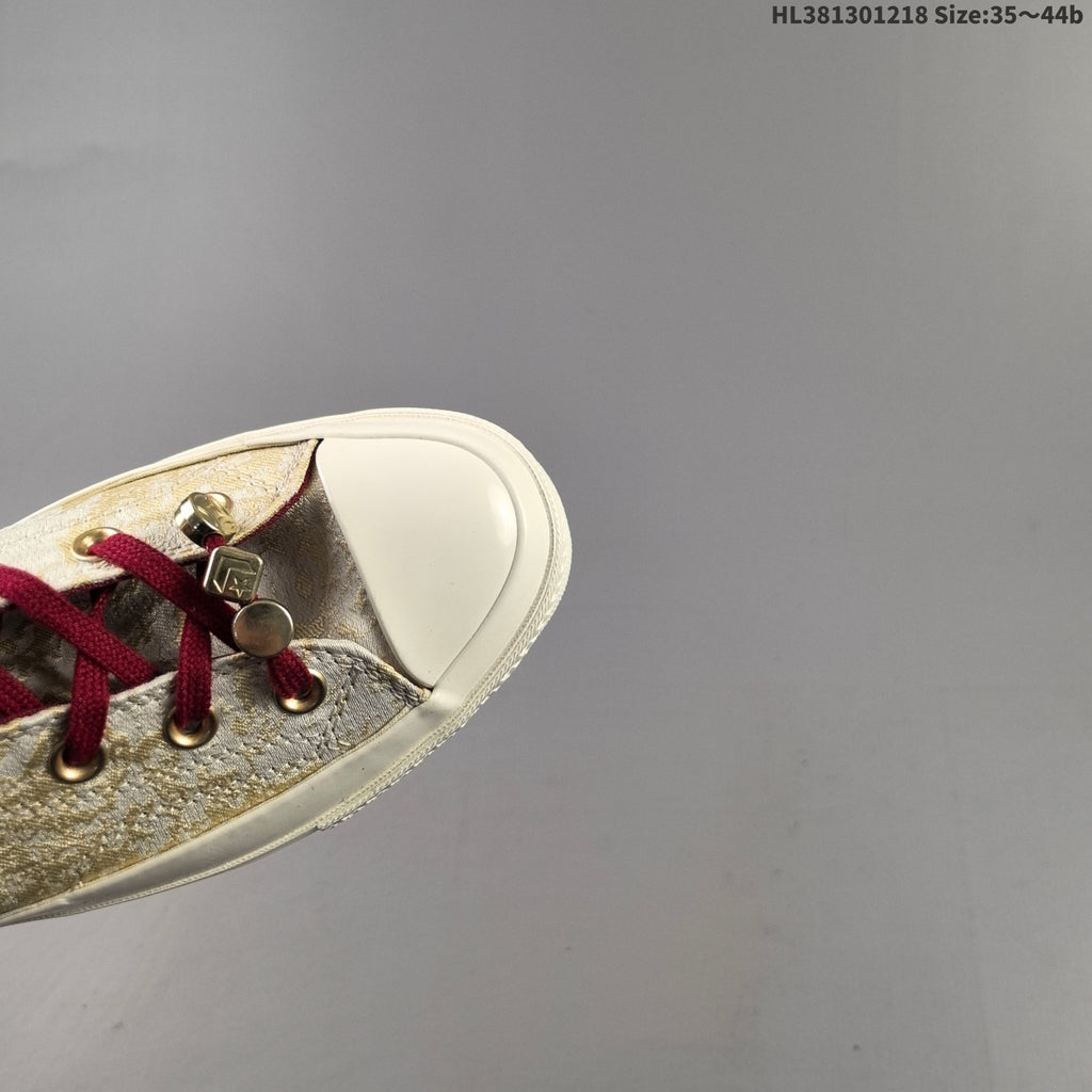 Converse Chuck 70 High-Top Sneakers, in Gold and Burgundy - product image from the listing.