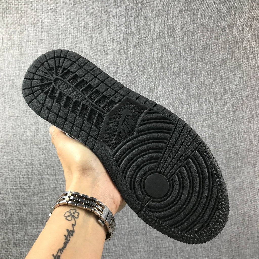 Air Jordan 1 Mid Black White Sneakers 554724-113 - product image from the listing.
