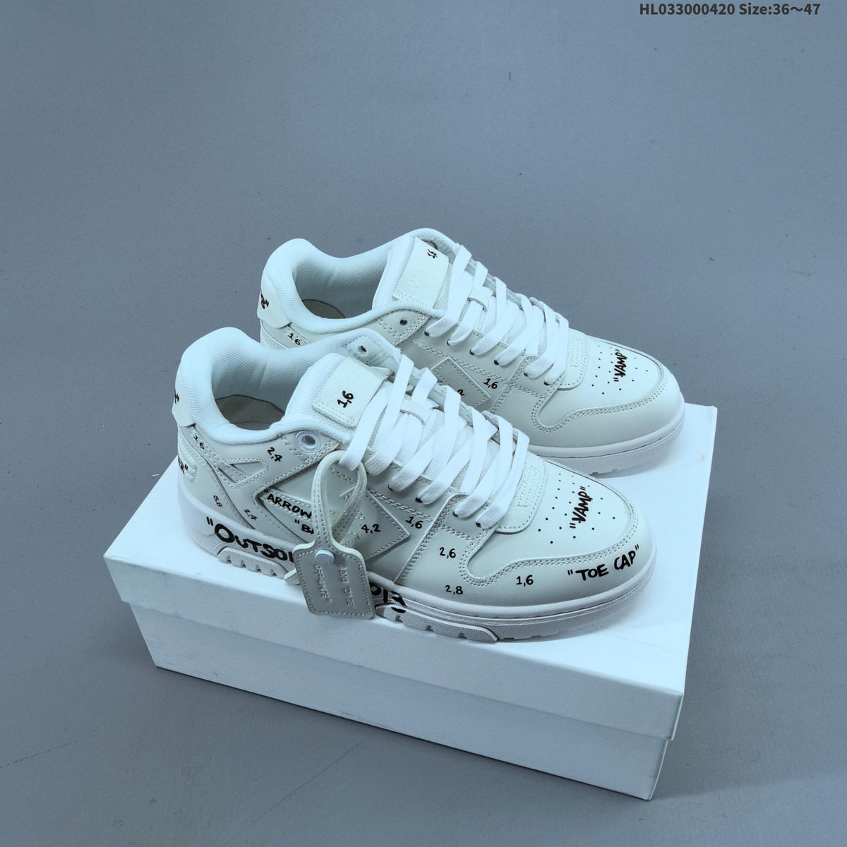 Off-White Low-Cut Sneakers in White with Arrows Detail - product image from the listing.