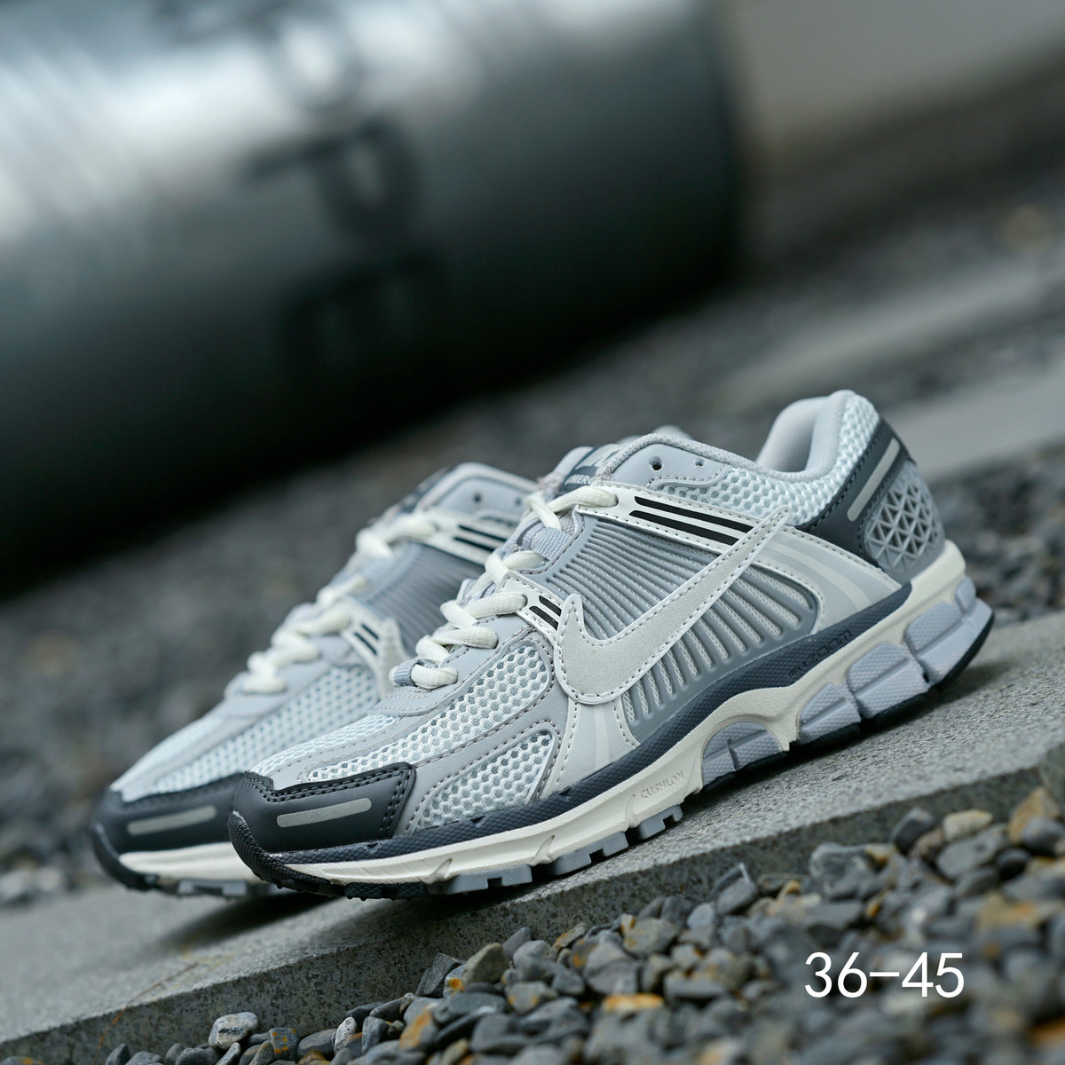 Light Gray and Navy Nike Air Zoom Vomero 5 Sneakers - product image from the listing.