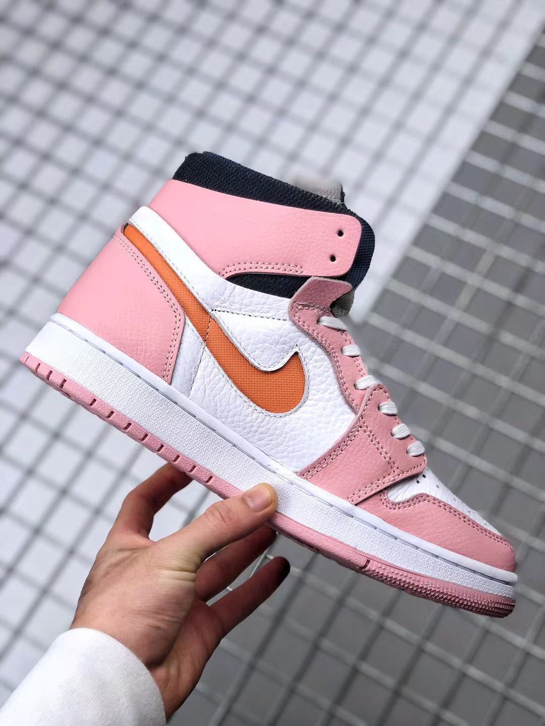 Jordan 1 High Zoom CMFT Sneakers in Pink White Orange CT0979-601 - product image from the listing.