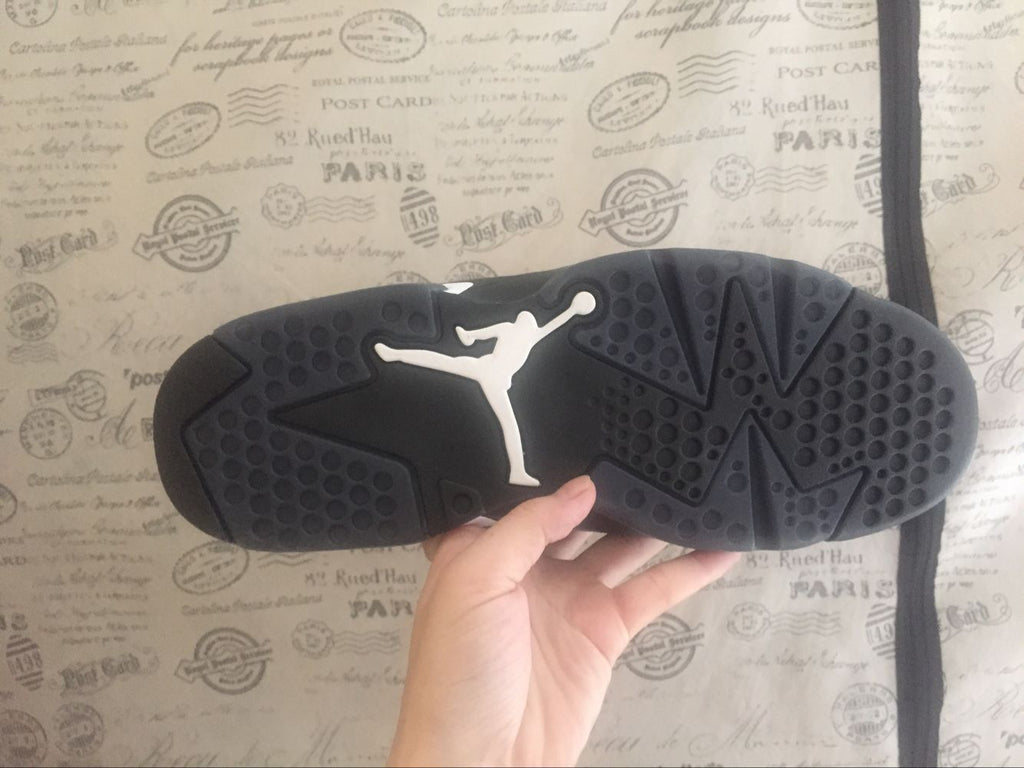 Jordan 6 Retro Black Cat High-Top Sneakers in Black and White - product image from the listing.