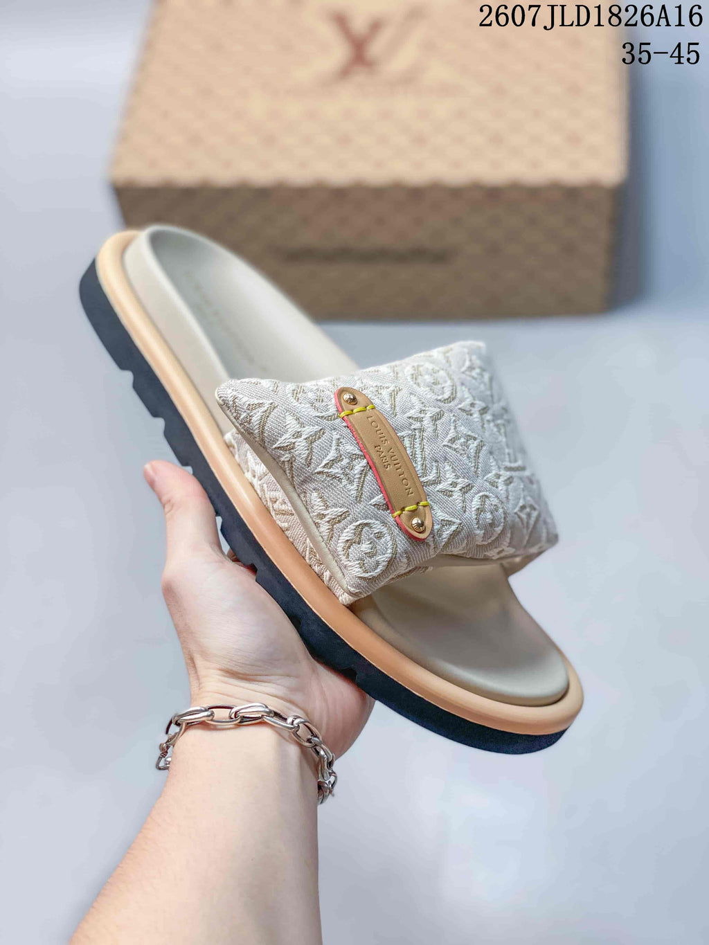Louis Vuitton Pool Pillow Monogram Slides in Blue Beige JLD1826A16 - product image from the listing.