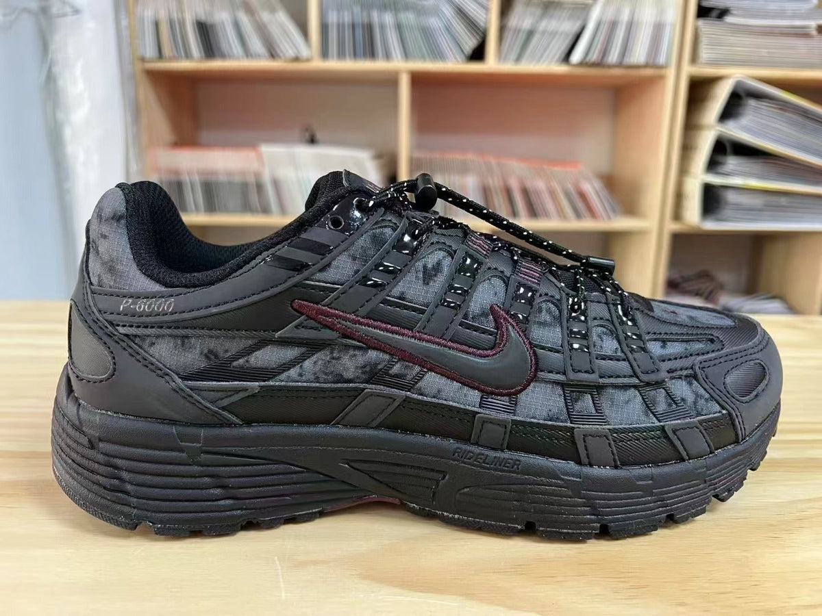 Nike P-6000 Trainers, Black and Gray, HQ4054-001 - product image from the listing.