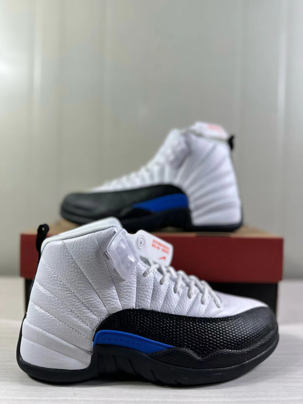 Air Jordan 12 Retro White Black Game in Royal CT8013-140 - product image from the listing.