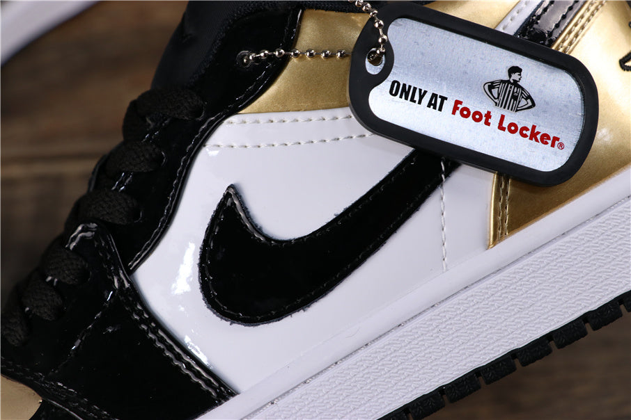 Jordan 1 Low Sneakers in Black Gold CQ9447-700 - product image from the listing.
