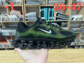 Nike Air Liquid Max Running Shoes in Black Volt - product image from the listing.