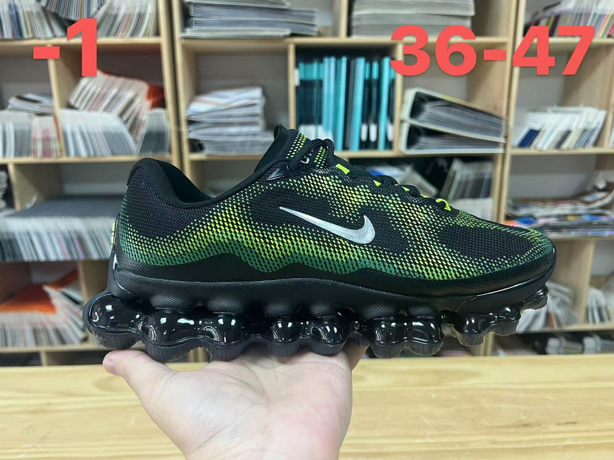Nike Air Liquid Max Running Shoes in Black Volt - product image from the listing.