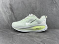 White and Lime Nike ZoomX Running Shoes - product image from the listing.
