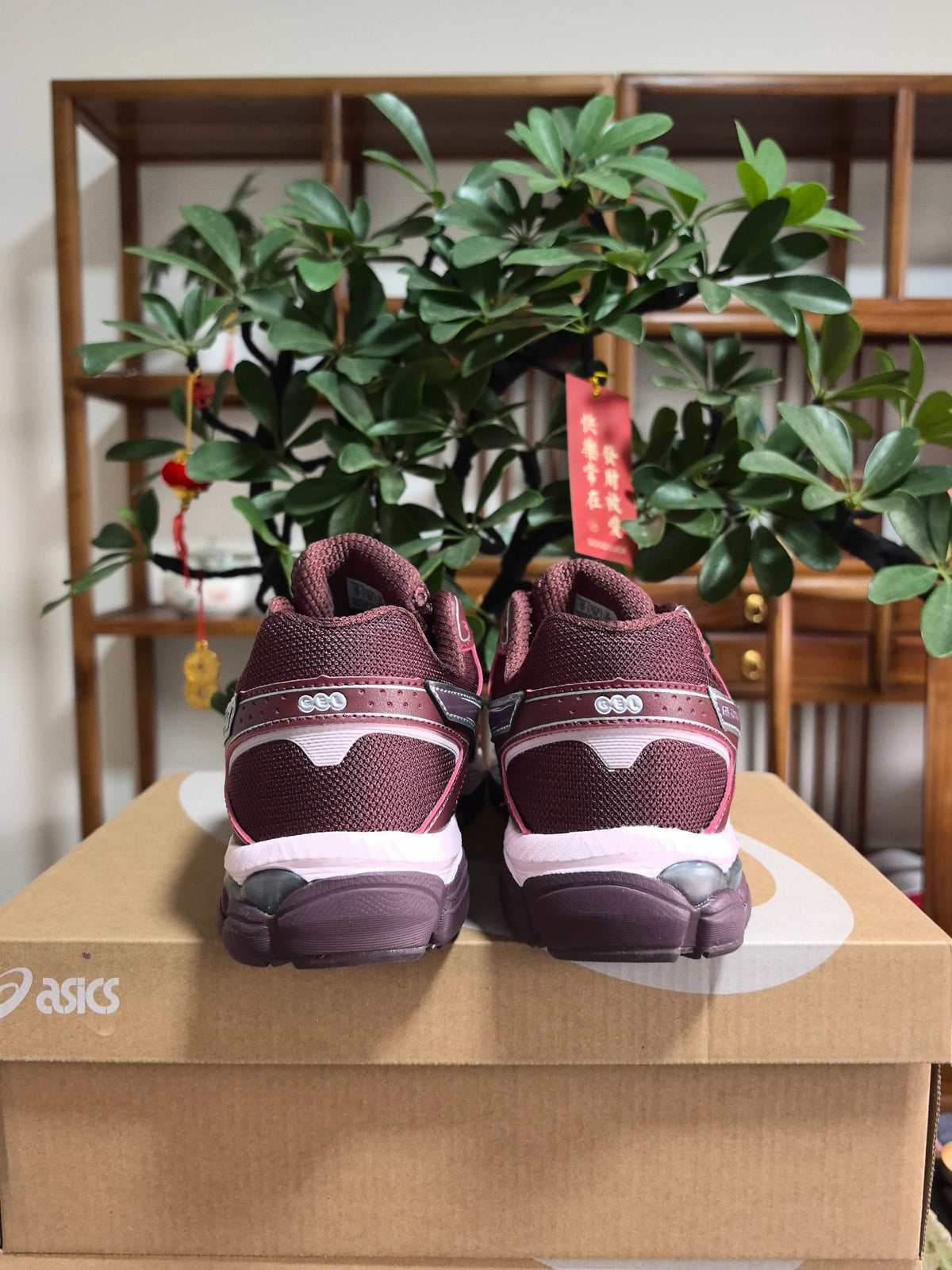 ASICS GEL-Cumulus 16 Sneakers in Sunset in Red - product image from the listing.