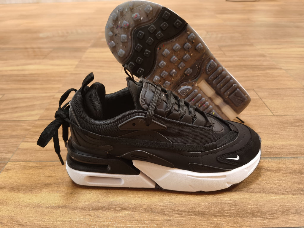 Nike Air Max Scorpion Sneakers in Black and White - product image from the listing.
