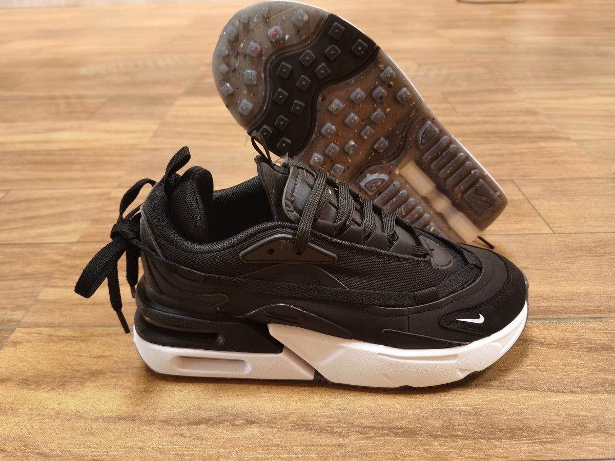 Nike Air Max Scorpion Sneakers in Black and White - product image from the listing.