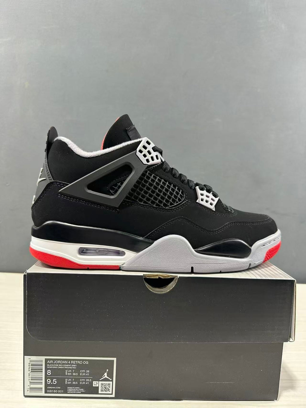 Air Jordan 4 Retro Bred Black Red Sneakers IX8180-001 - product image from the listing.