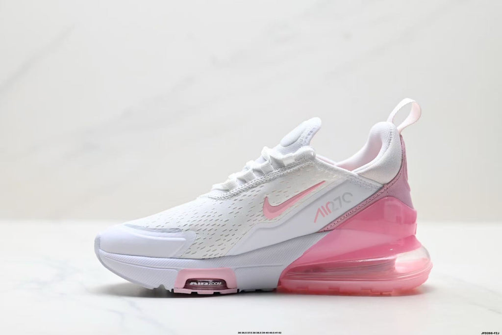 Nike Air Zoom Sneakers in White and Pink - product image from the listing.