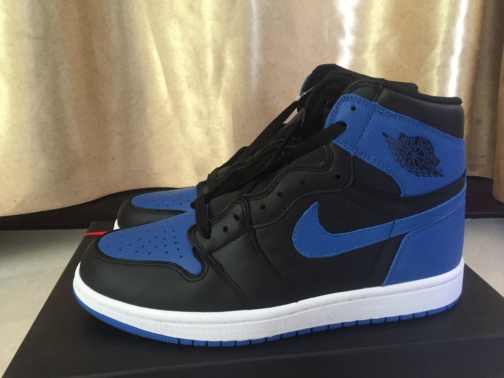 Jordan 1 High Sneakers in Black and Royal Blue - product image from the listing.