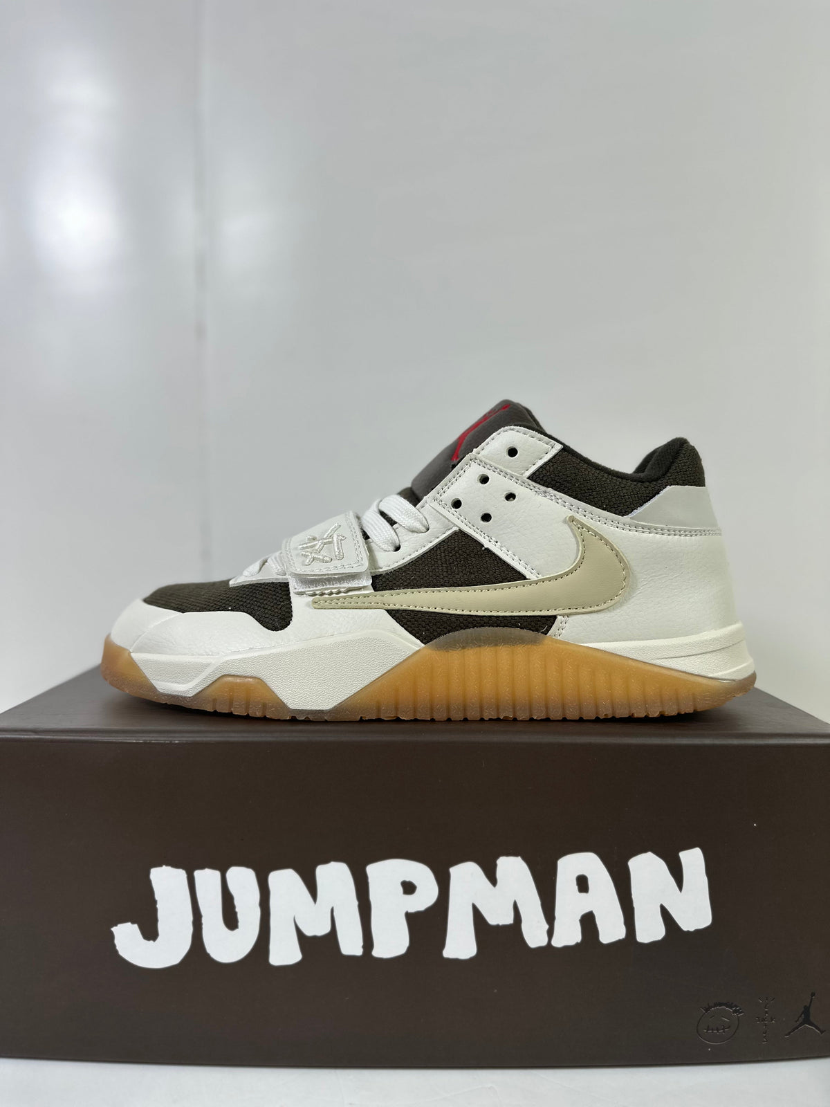Jordan Jumpman Jack TR Low Sneakers in Sail Dark Mocha FZ8117-100 - product image from the listing.
