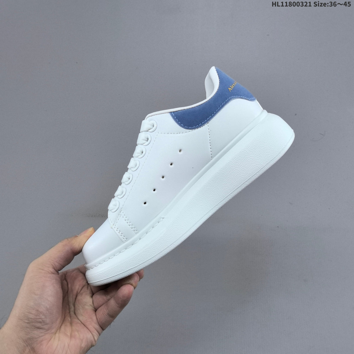 Alexander McQueen Oversized Low-Top Sneakers, in White and Blue - product image from the listing.