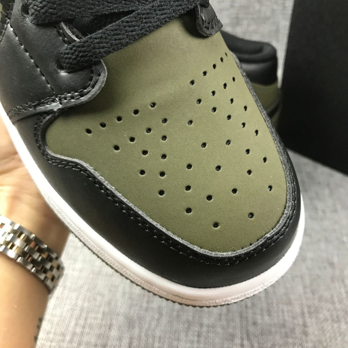 Black and Olive Green Jordan 1 Mid Sneakers - product image from the listing.