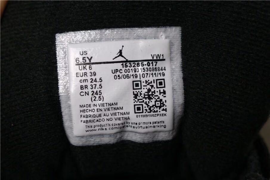 Air Jordan 12 Reverse Taxi Sneakers Black 153265-017 - product image from the listing.