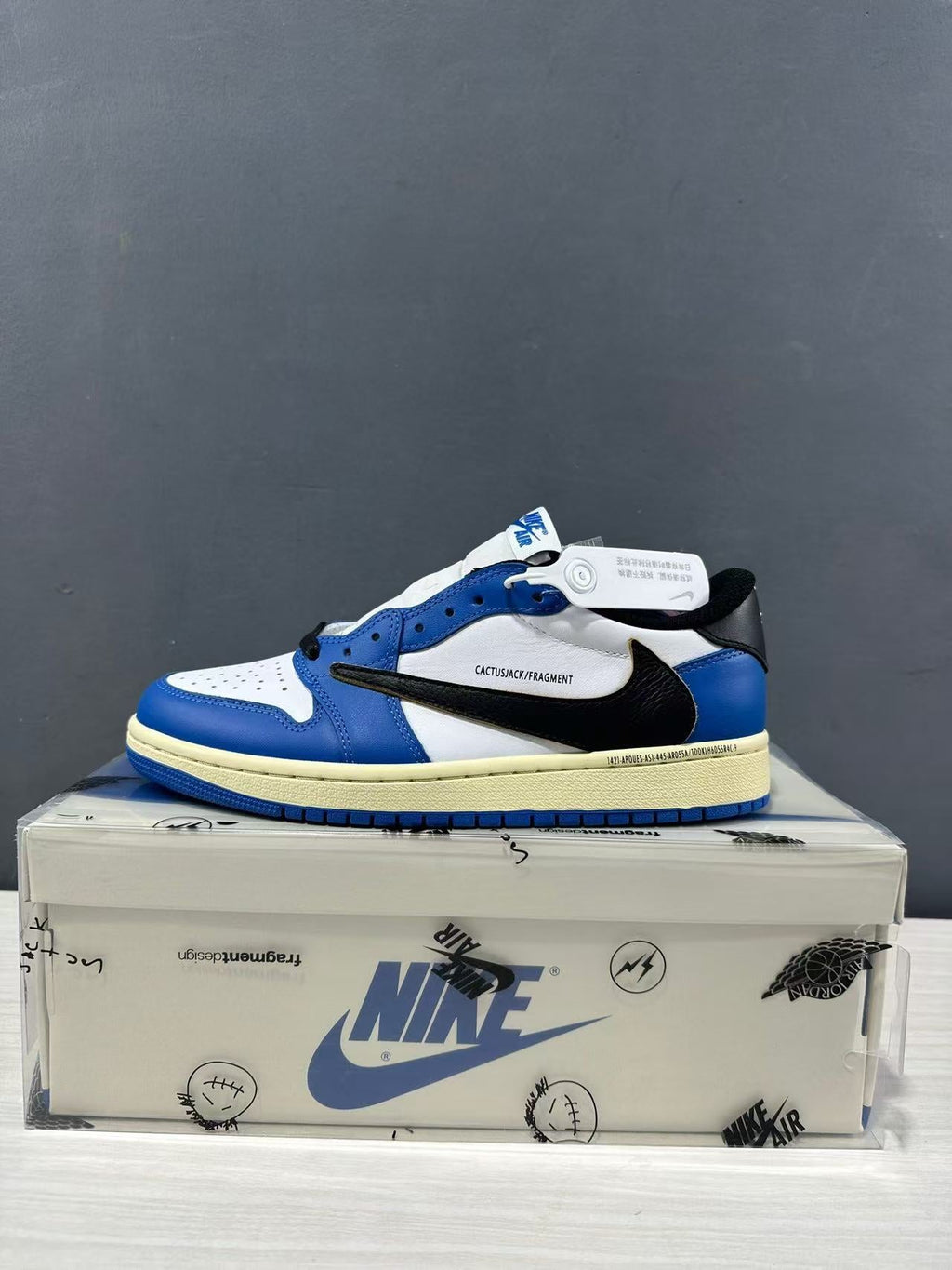 Jordan 1 Low Travis Scott Fragment in Blue White DM7866-141 - product image from the listing.