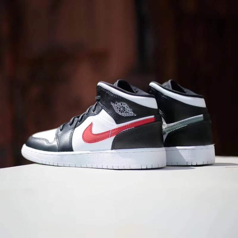 Air Jordan 1 Mid Four-Color Swoosh Sneakers - product image from the listing.