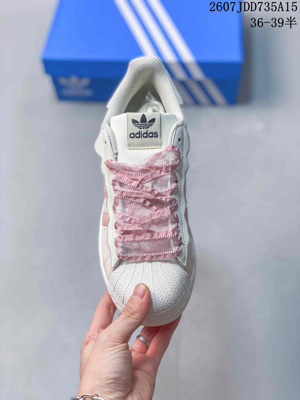 adidas Superstar Sneakers in White and Pink 2607JDD735A15 - product image from the listing.