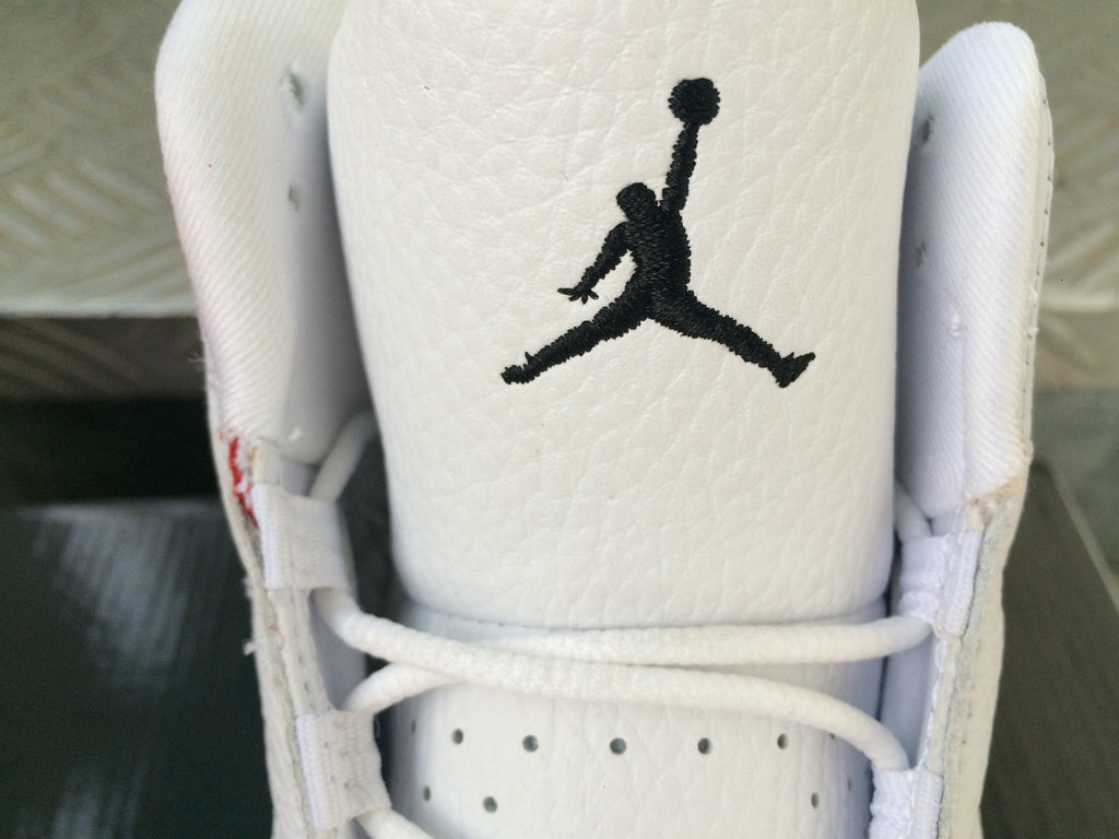 Air Jordan 13 Sneakers in White Red Black - product image from the listing.