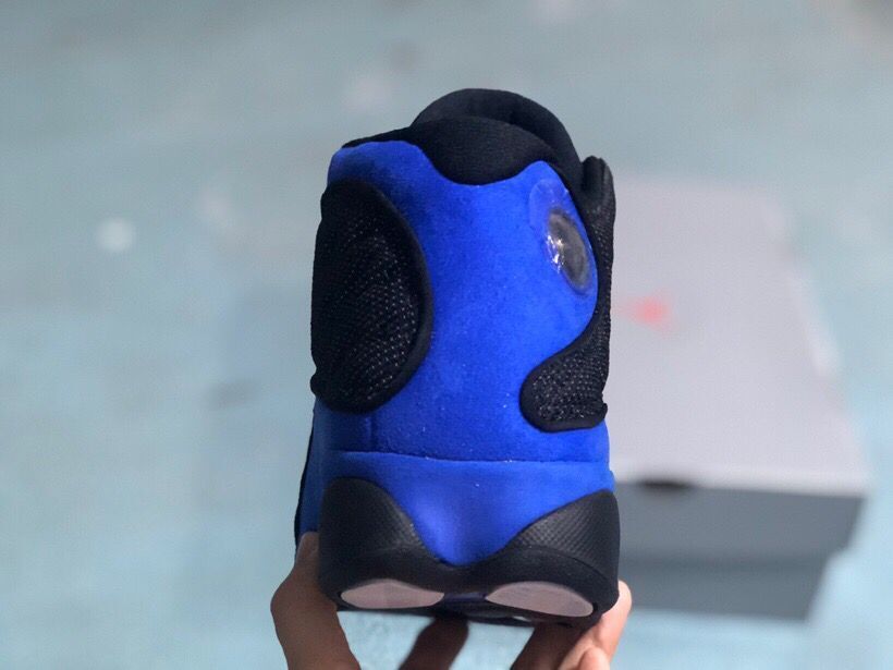 Jordan 13 Retro Sneakers Black/Royal in Blue - product image from the listing.