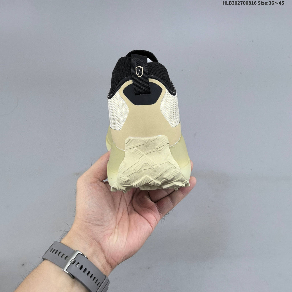 Cream and Black Norda 055 Trail Running Shoes - product image from the listing.