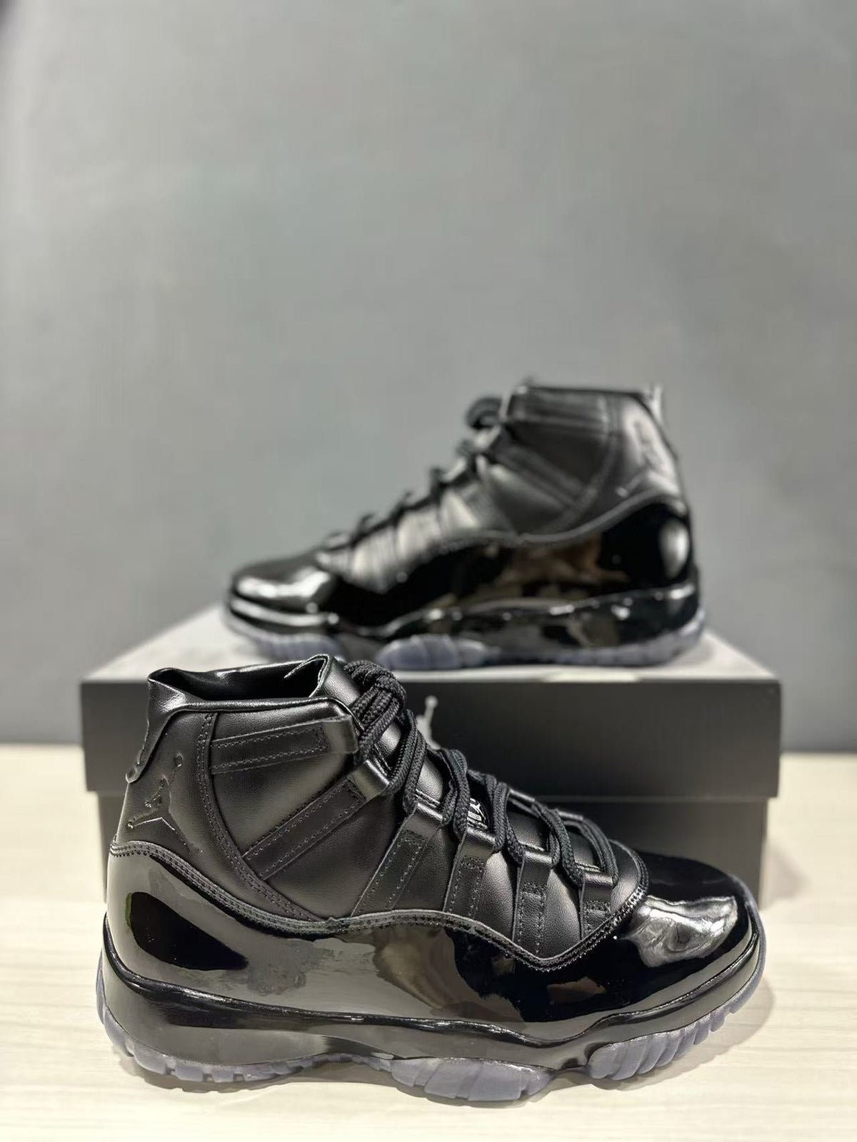Comme des Garçons × Jordan Air Jordan 11 Sneakers in Black - product image from the listing.
