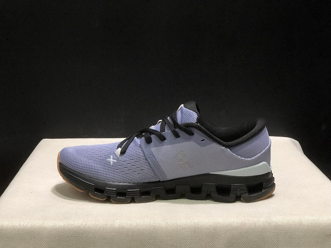 On Cloud X 4 Sneakers in Feather in Black - product image from the listing.