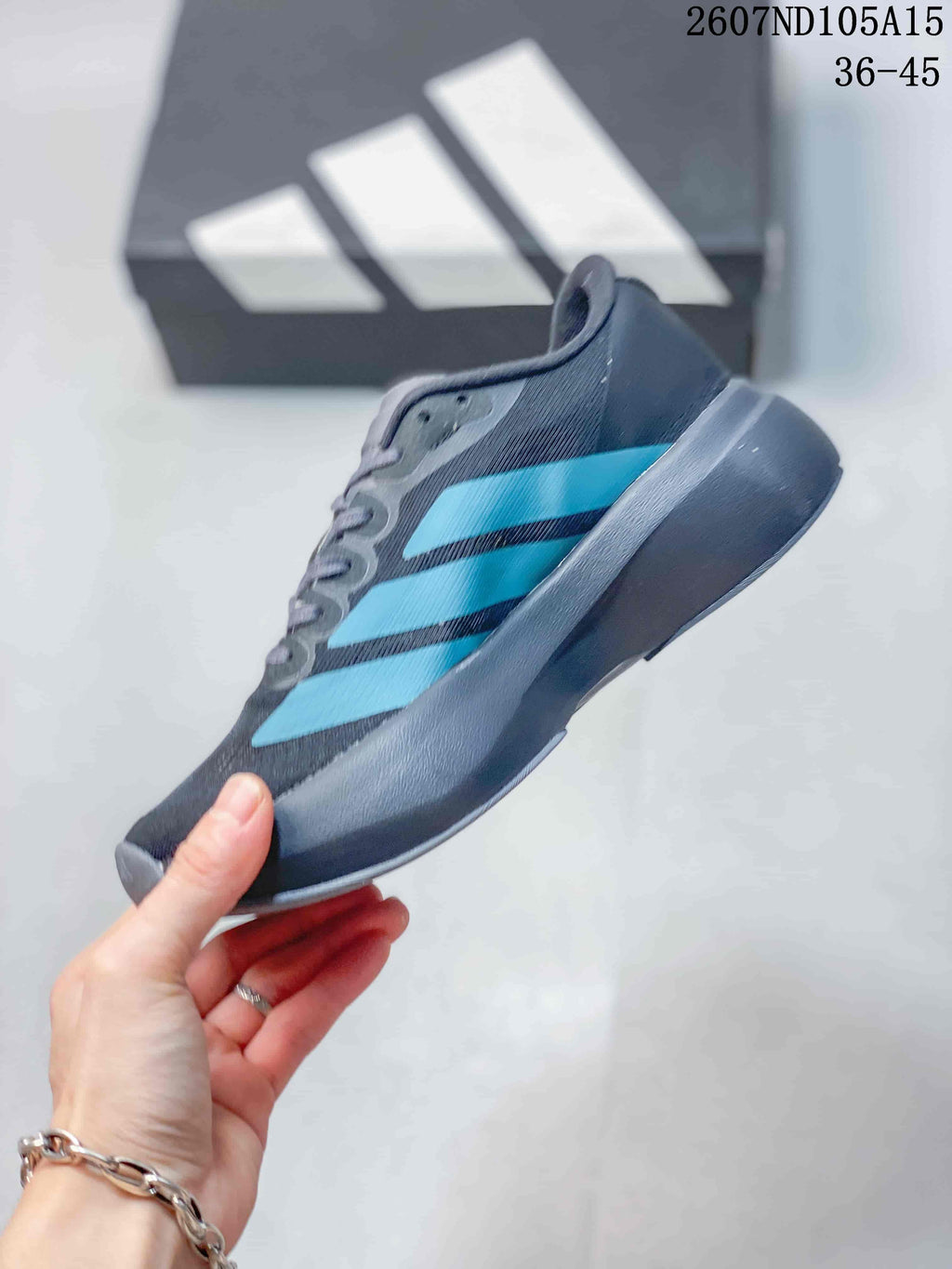 Adidas Adizero Evo SL Sneakers in Dark Gray Blue 2607ND105A15 - product image from the listing.