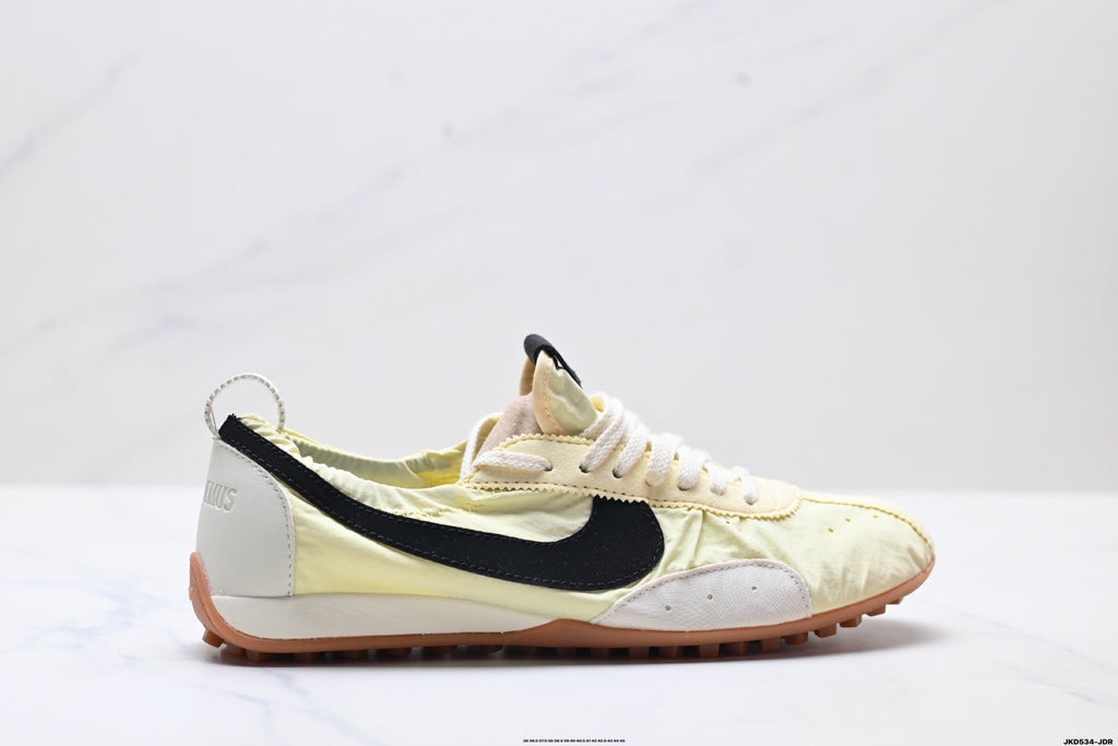 Jacquemus x Nike Jacumoon Sneakers, in Light Yellow and Black - product image from the listing.
