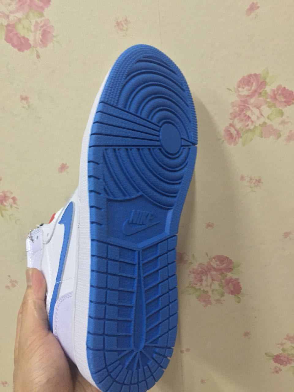 Air Jordan 1 High White and Royal Blue Sneakers - product image from the listing.