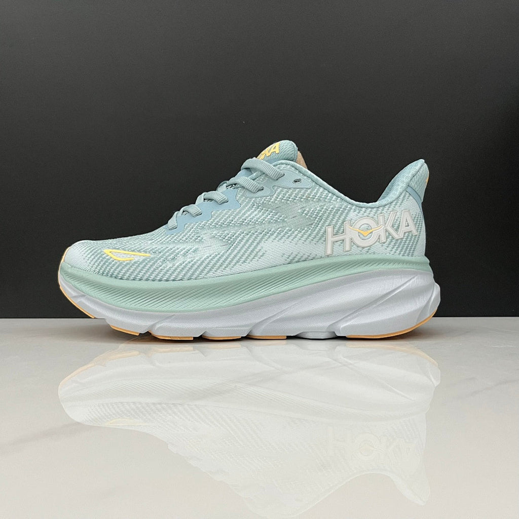 HOKA Clifton 9 Running Shoes in Mint and Yellow - product image from the listing.