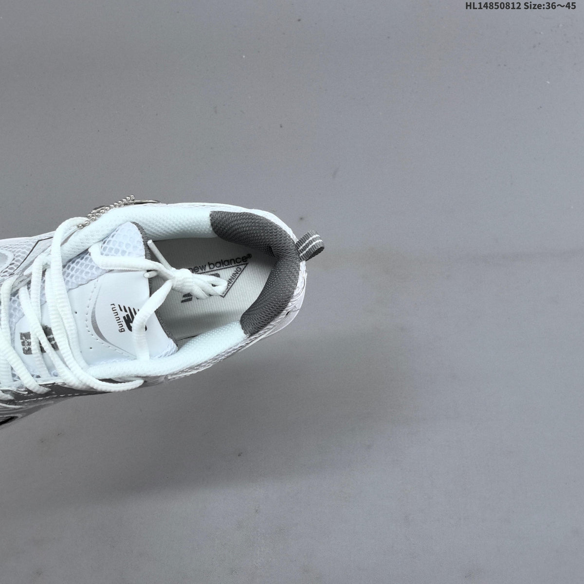 New Balance MR530AD Retro Mesh Sneakers in White Silver - product image from the listing.