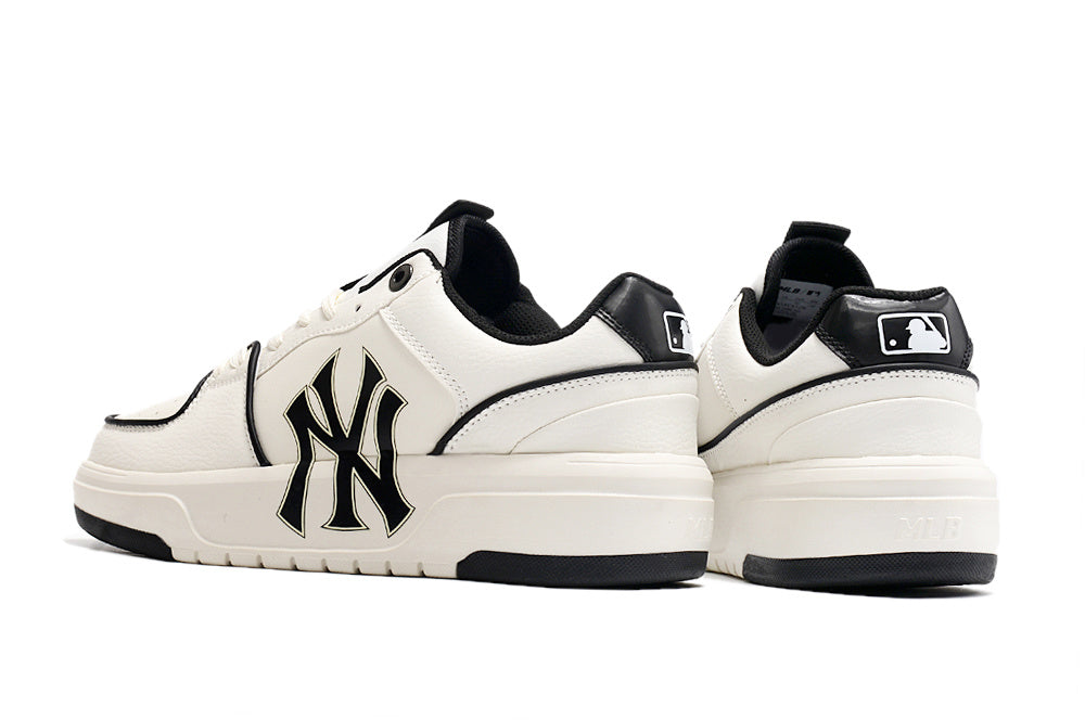 MLB New York Yankees Low-Top Sneakers in White and Black - product image from the listing.