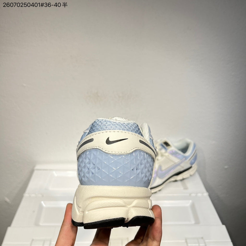 Nike Air Zoom Vomero 5 Trainers in Cream, Blue and Lavender - product image from the listing.