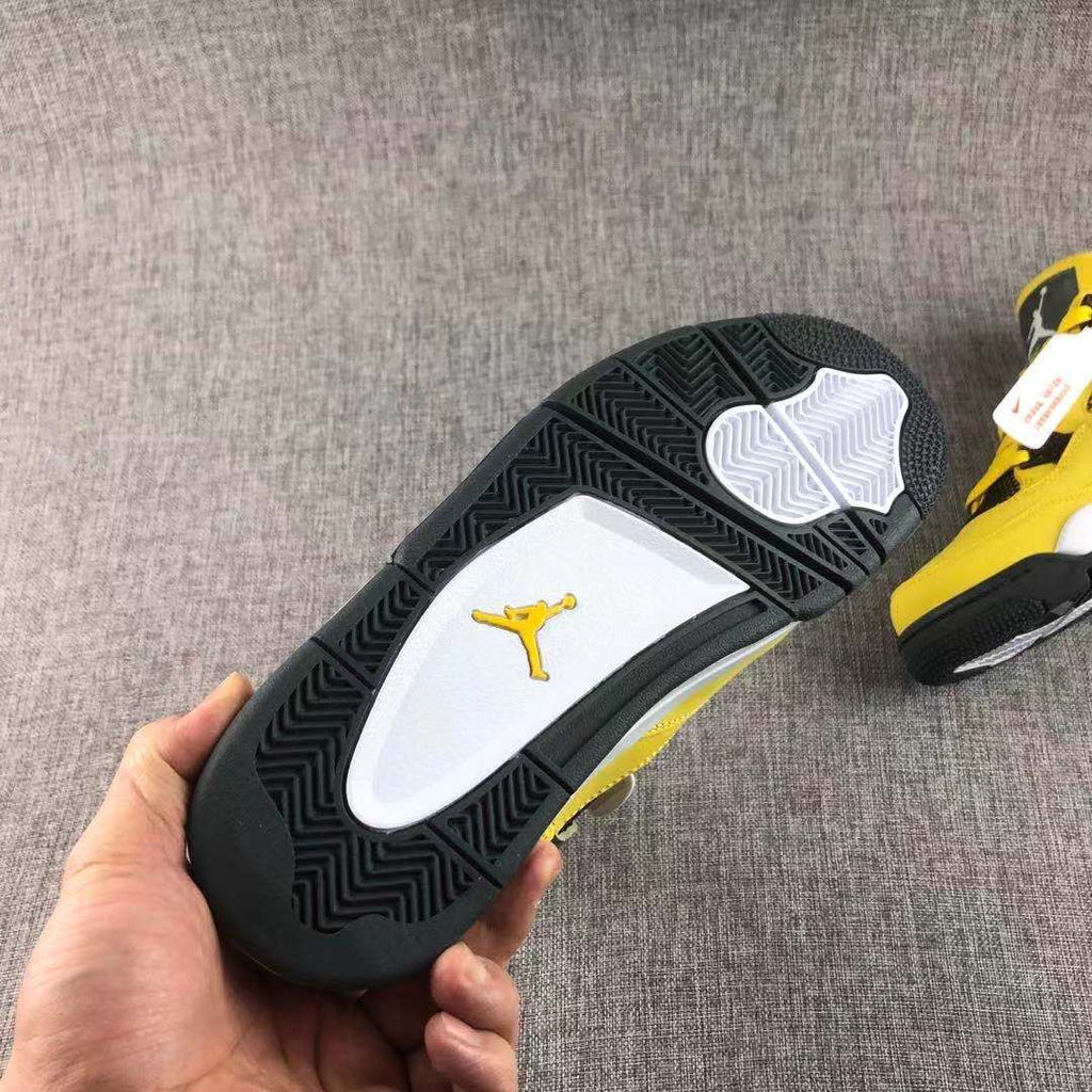 Air Jordan 4 Lightning Yellow Black Sneakers - product image from the listing.