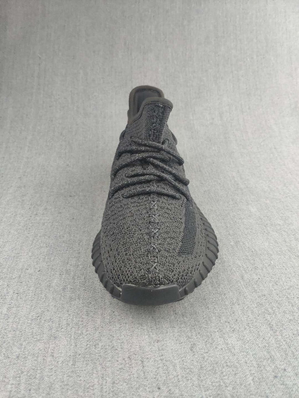 Yeezy Boost 350 V2 Sneakers in Dark Gray Knit - product image from the listing.