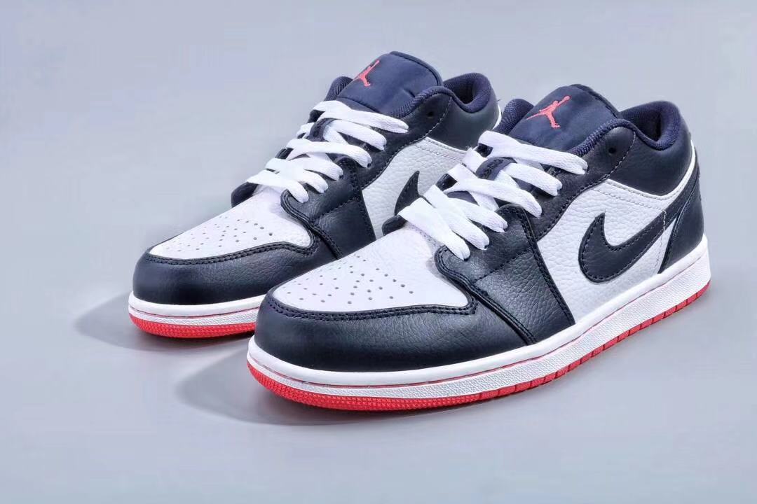 Jordan 1 Low Sneakers in Midnight Navy White Red - product image from the listing.