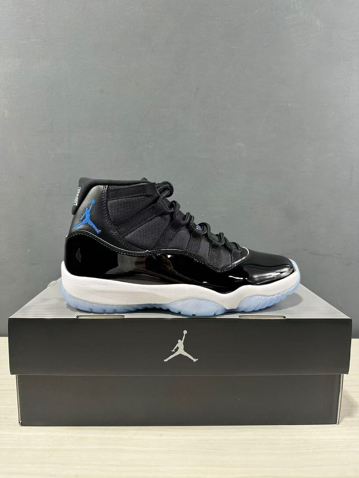 Air Jordan 11 Retro High Black Blue Sneakers CT8012-900 - product image from the listing.