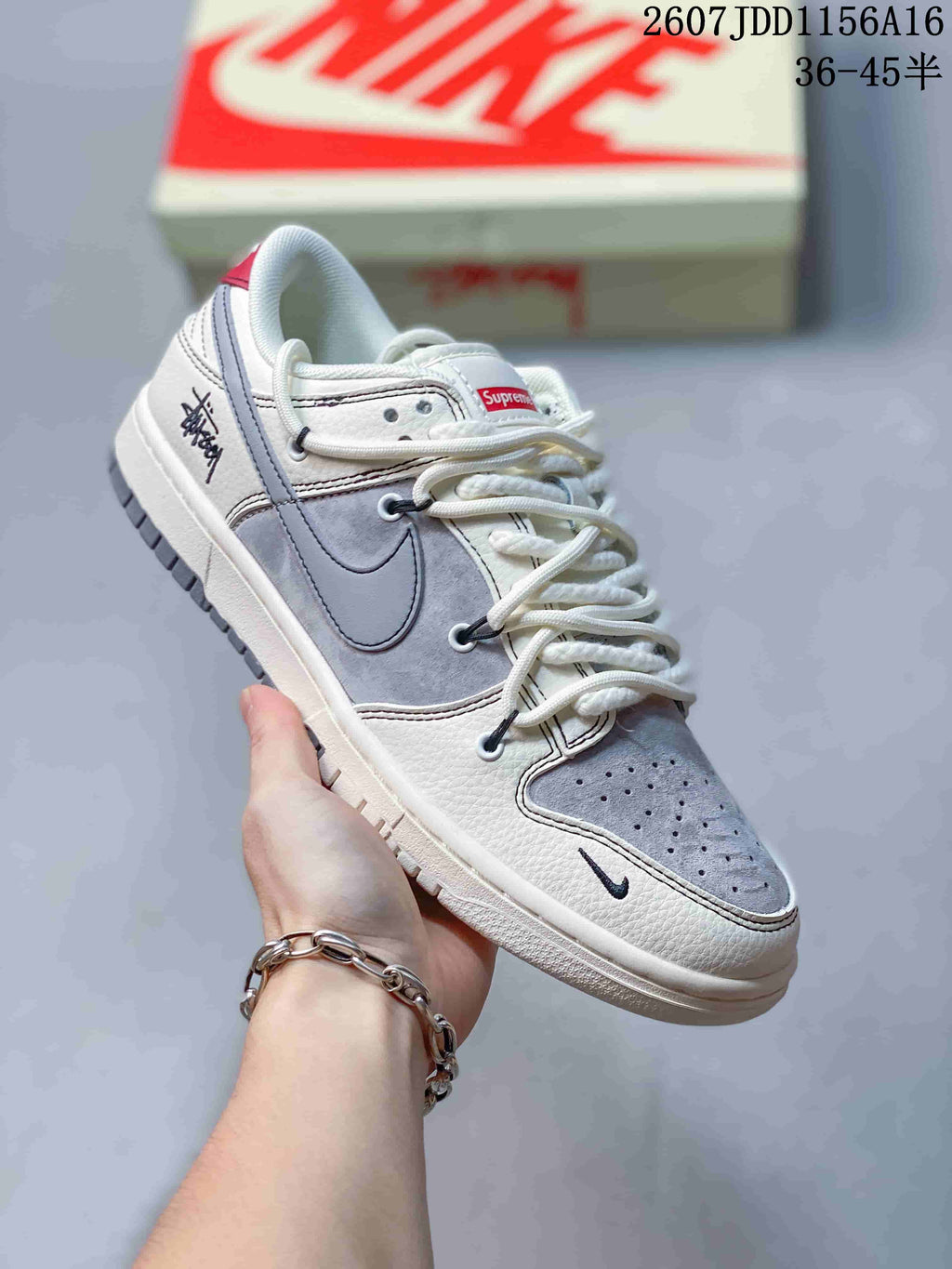 Nike SB Dunk Low Supreme-Style Sneakers in White Grey - product image from the listing.
