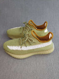 Yeezy 350 V2 Static Reflective Sneakers in Green - product image from the listing.
